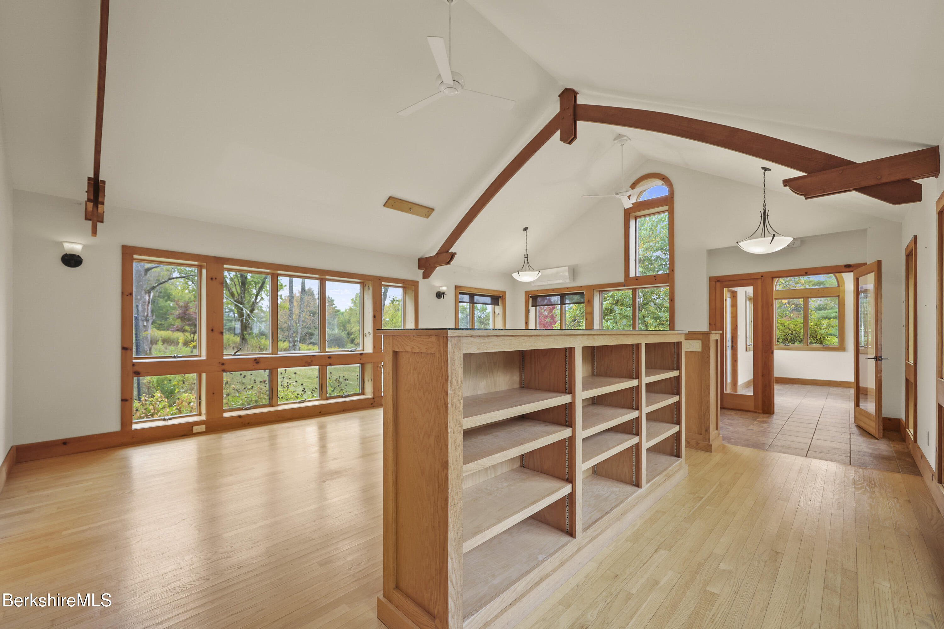 1030 Simonds Road Williamstown, MA 01267 - Photo 22 of 76 a view of an empty room with wooden floor and a window
