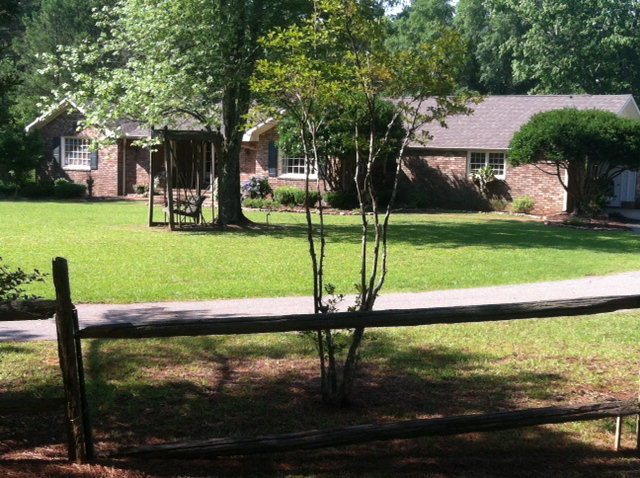 a view of a porch with a yard