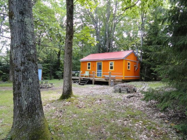 122 Elm Road Oxford, NY 13830 - Photo 1 of 1 Cabin in the woods at Lake Gerry.