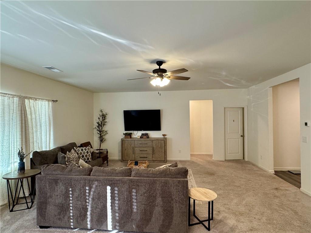 152 Andria Way Northwest Cartersville, GA 30120 - Photo 2 of 24 a living room with furniture and a flat screen tv