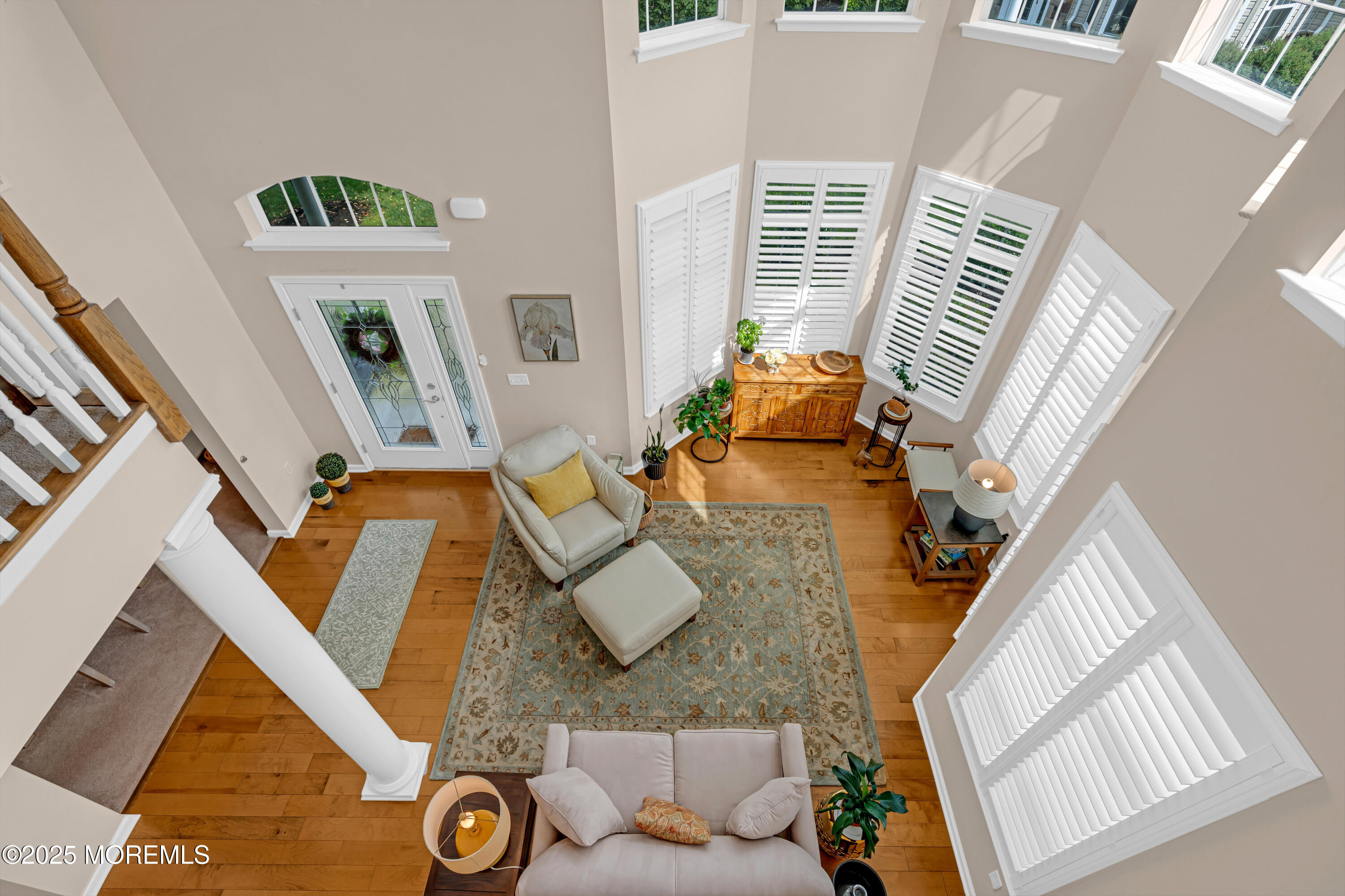37 Abbey Road Tinton Falls, NJ 07753 - Photo 13 of 18 a view of living room with furniture and a floor to ceiling window