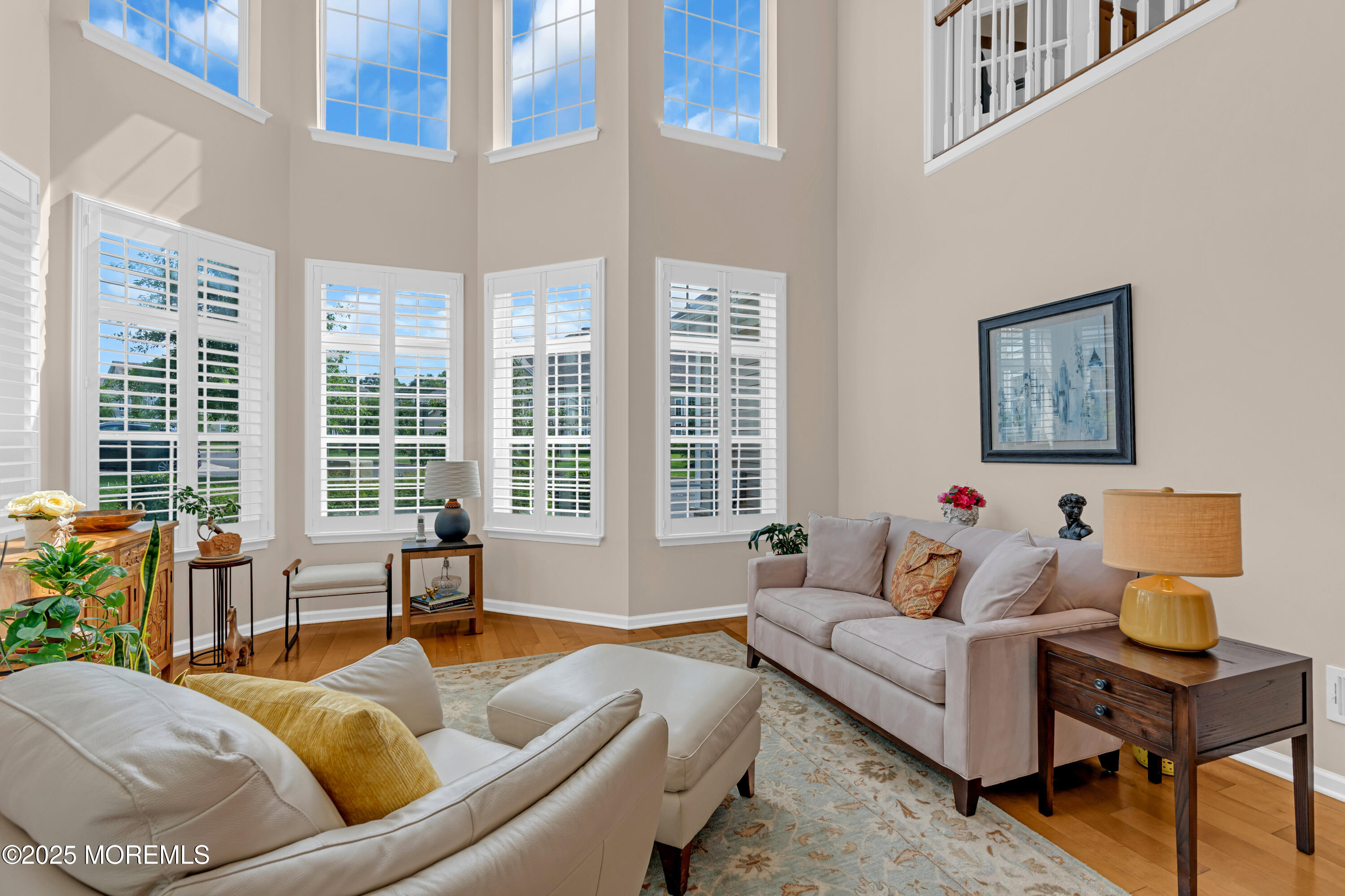 37 Abbey Road Tinton Falls, NJ 07753 - Photo 7 of 18 a living room with furniture and a large window