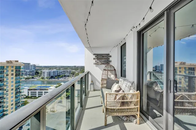 a view of swimming pool from a balcony