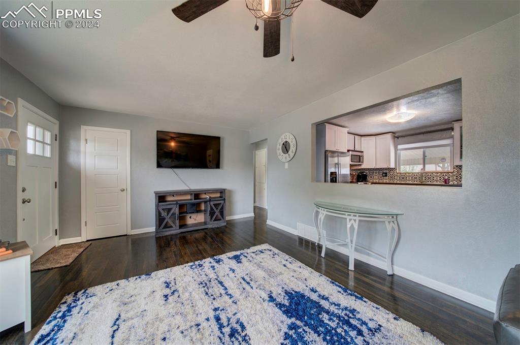 50 Duke Street Pueblo, CO 81005 - Photo 12 of 45 a bedroom with furniture and a flat screen tv