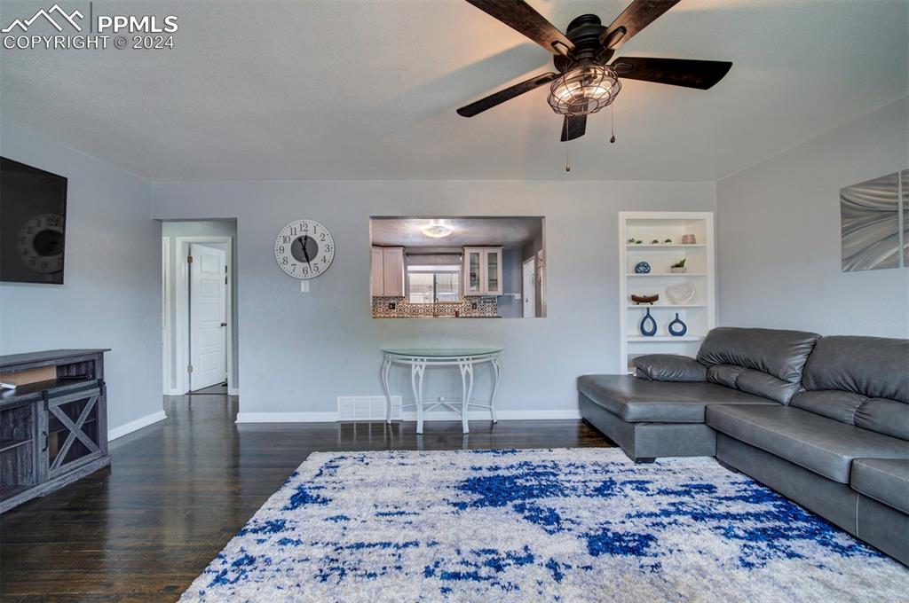 50 Duke Street Pueblo, CO 81005 - Photo 14 of 45 a living room with furniture and a wooden floor