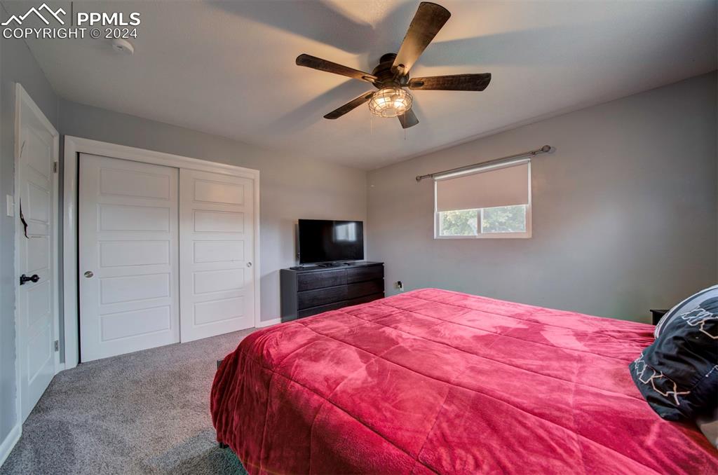 50 Duke Street Pueblo, CO 81005 - Photo 26 of 45 a bedroom with a bed and a tv