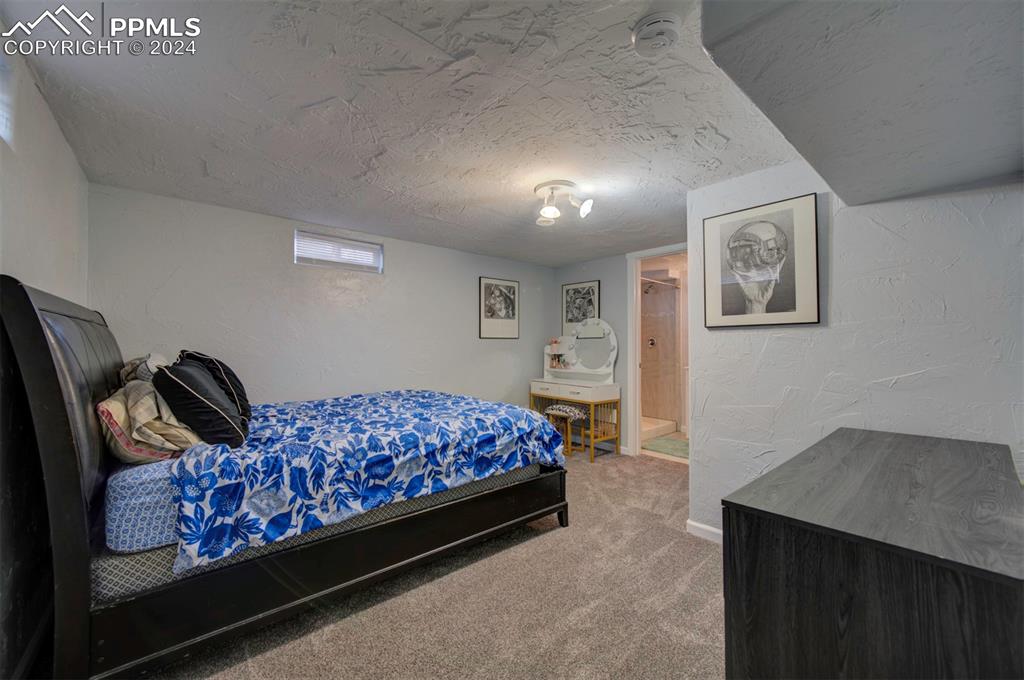 50 Duke Street Pueblo, CO 81005 - Photo 34 of 45 a bedroom with a bed and dresser