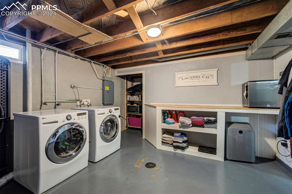 50 Duke Street Pueblo, CO 81005 - Photo 38 of 45 a utility room with dryer and washer