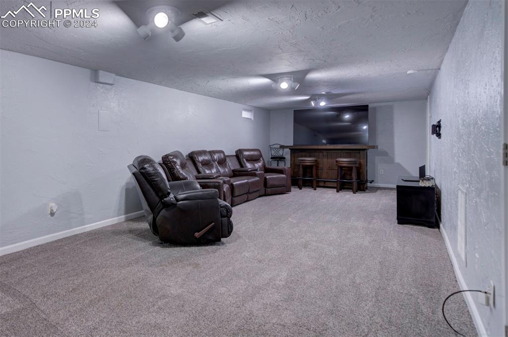 50 Duke Street Pueblo, CO 81005 - Photo 43 of 45 a living room with furniture and a flat screen tv