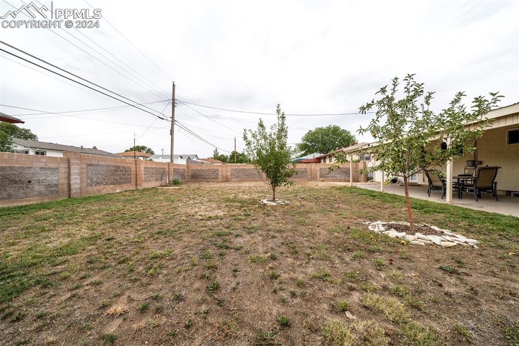 50 Duke Street Pueblo, CO 81005 - Photo 5 of 45 a view of a yard with an outdoor space