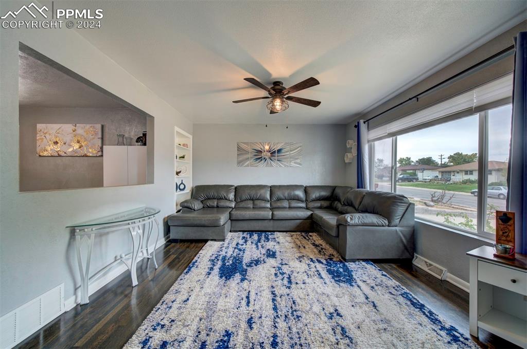 50 Duke Street Pueblo, CO 81005 - Photo 7 of 45 a living room with furniture and a large window