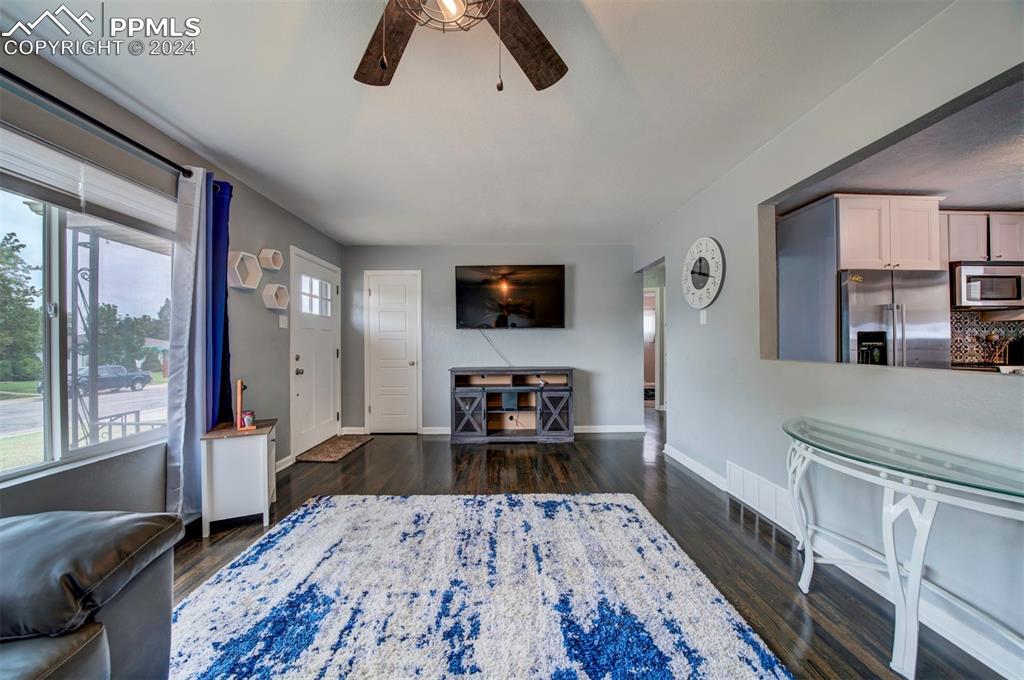 50 Duke Street Pueblo, CO 81005 - Photo 9 of 45 a living room with furniture and a flat screen tv