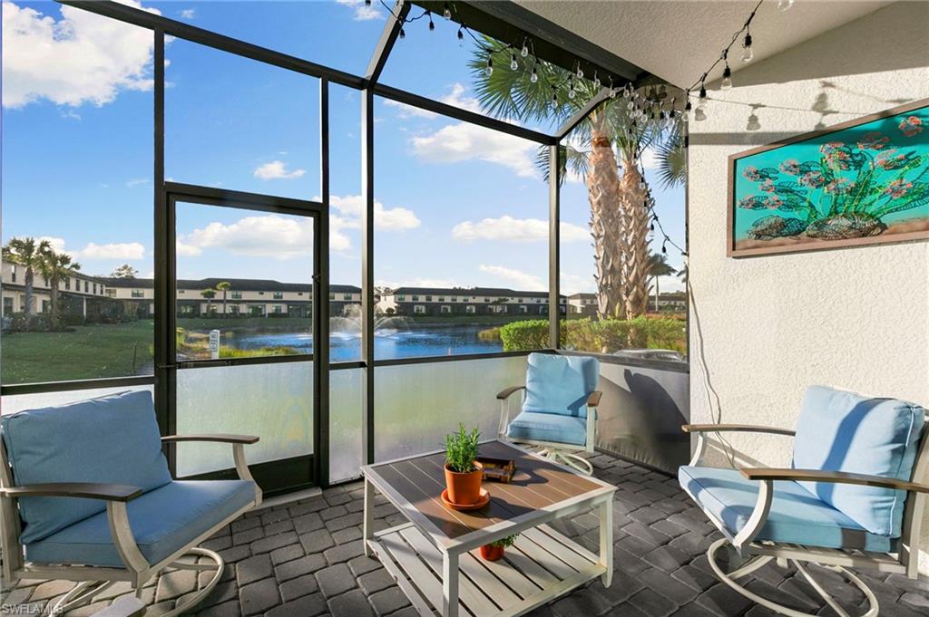 7421 Rockefeller Drive Naples, FL 34119 - Photo 26 of 37 a roof deck with couch
