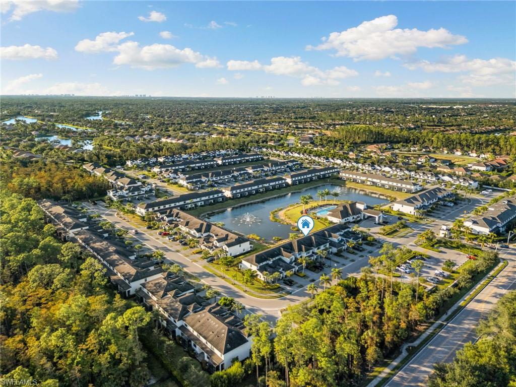 7421 Rockefeller Drive Naples, FL 34119 - Photo 30 of 37 an aerial view of residential houses with outdoor space
