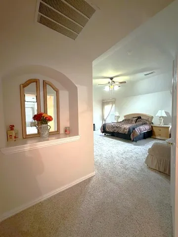 a view of a car parked in front of a building