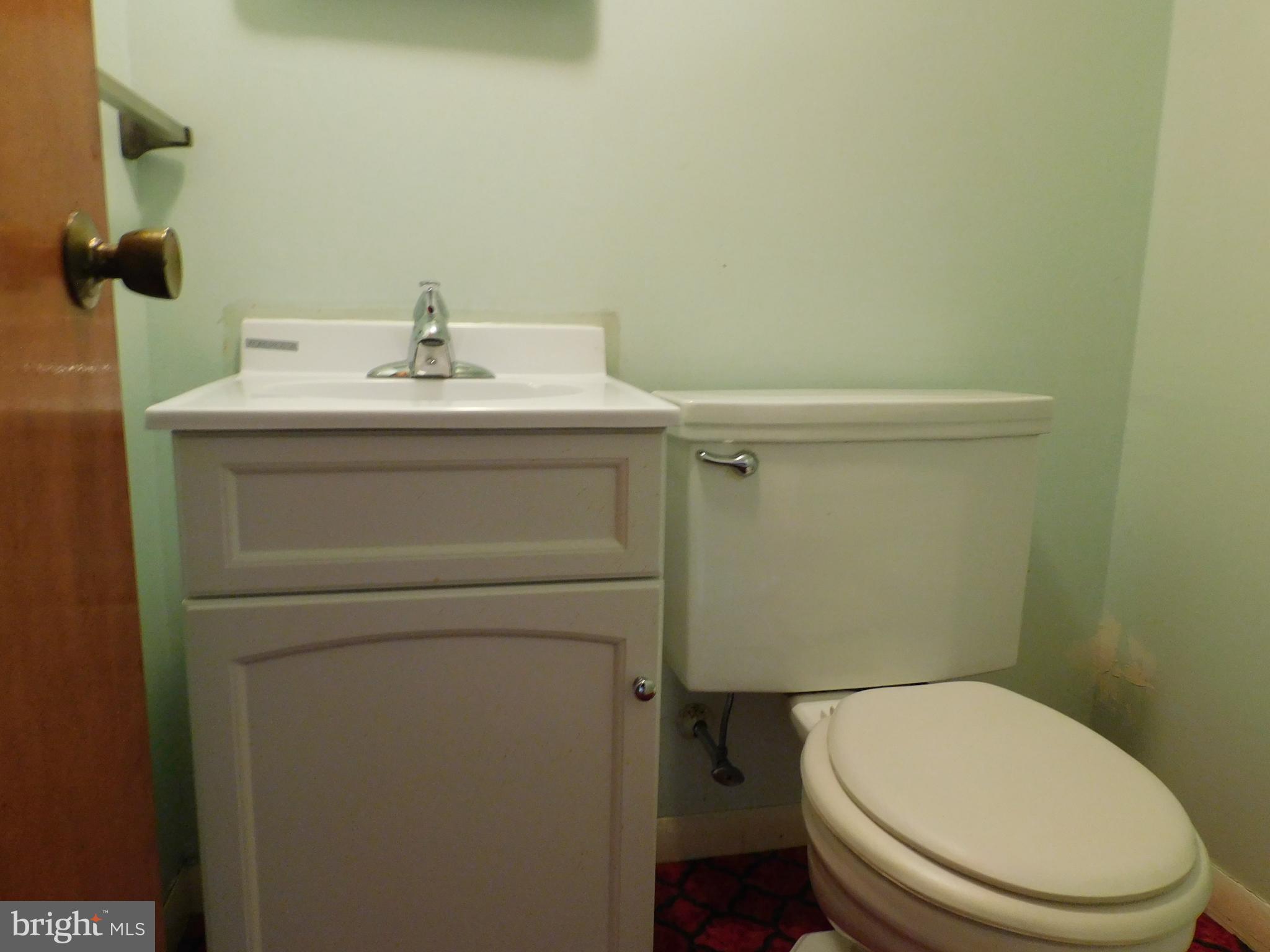 723 Charette Road Philadelphia, PA 19115 - Photo 16 of 25 Half bath off foyer entry