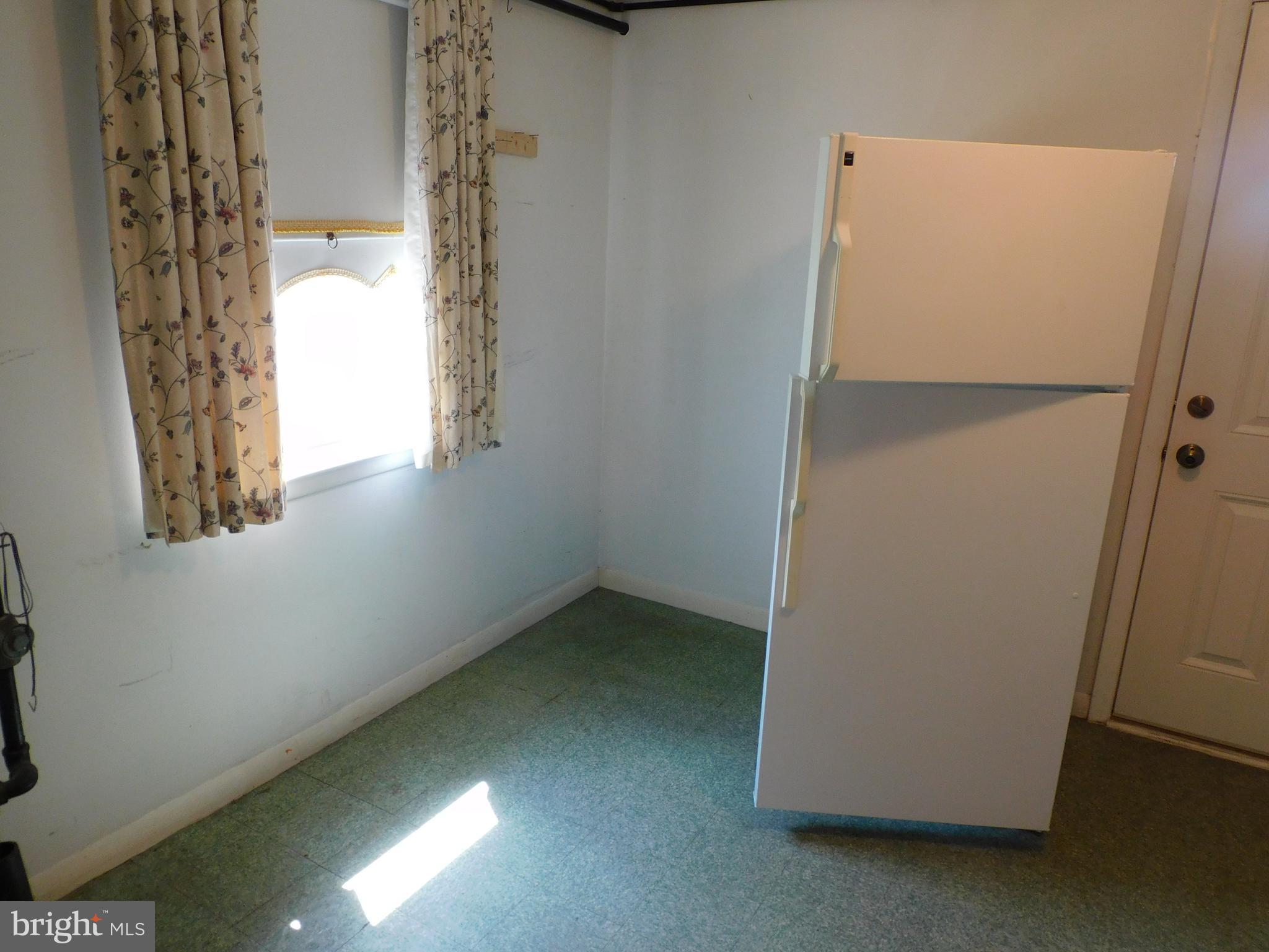 723 Charette Road Philadelphia, PA 19115 - Photo 17 of 25 Laundry room with exit door