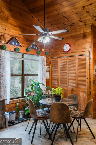 a kitchen with stainless steel appliances granite countertop a sink and a refrigerator