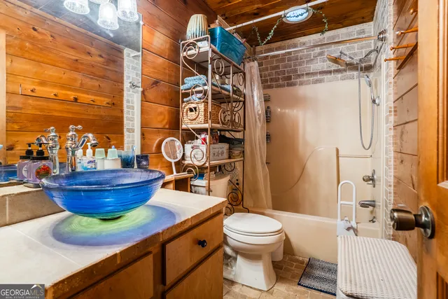 a kitchen with a stove and a sink