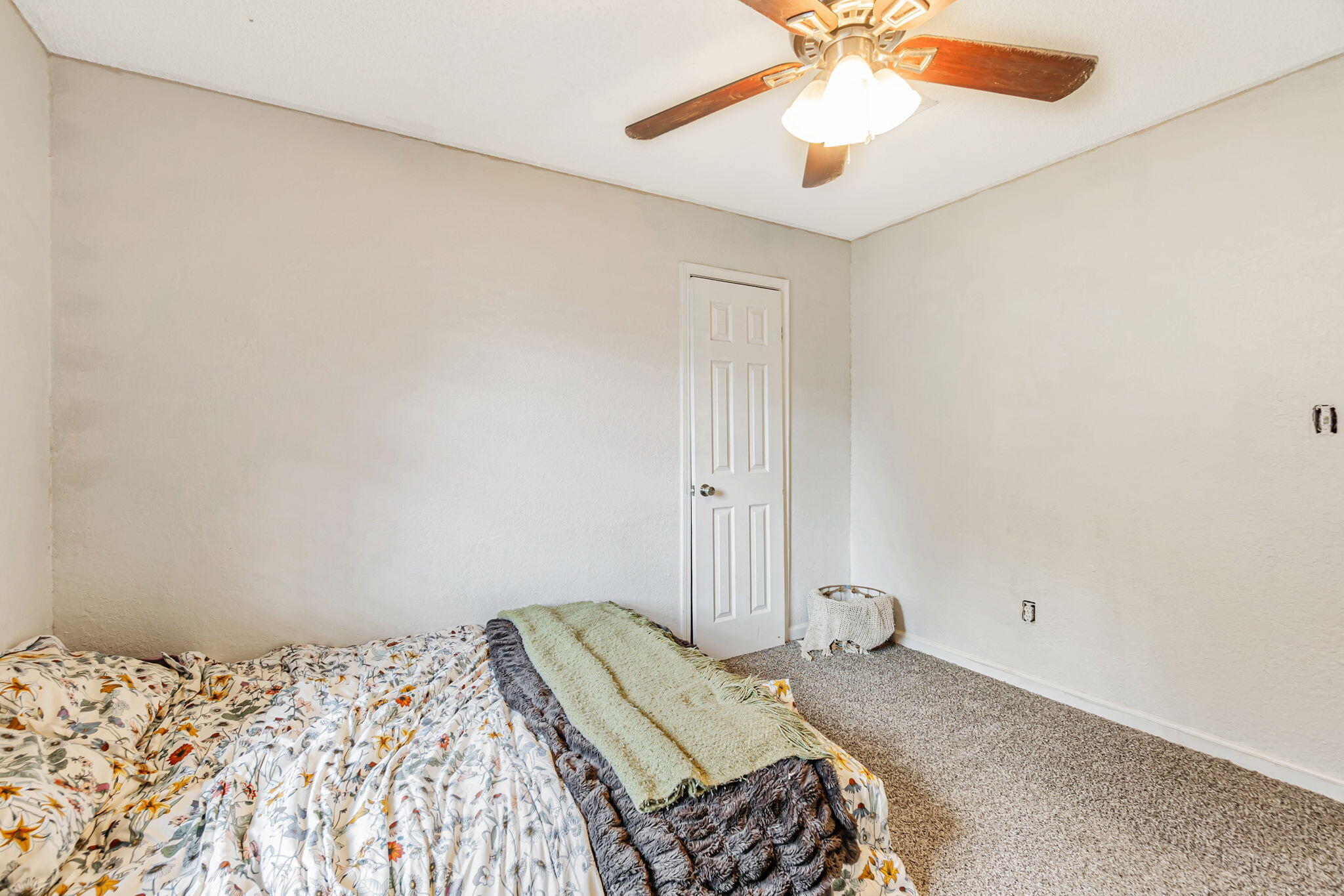 6517 Kennington Circle Milton, FL 32570 - Photo 23 of 37 a bedroom with a bed and a chandelier