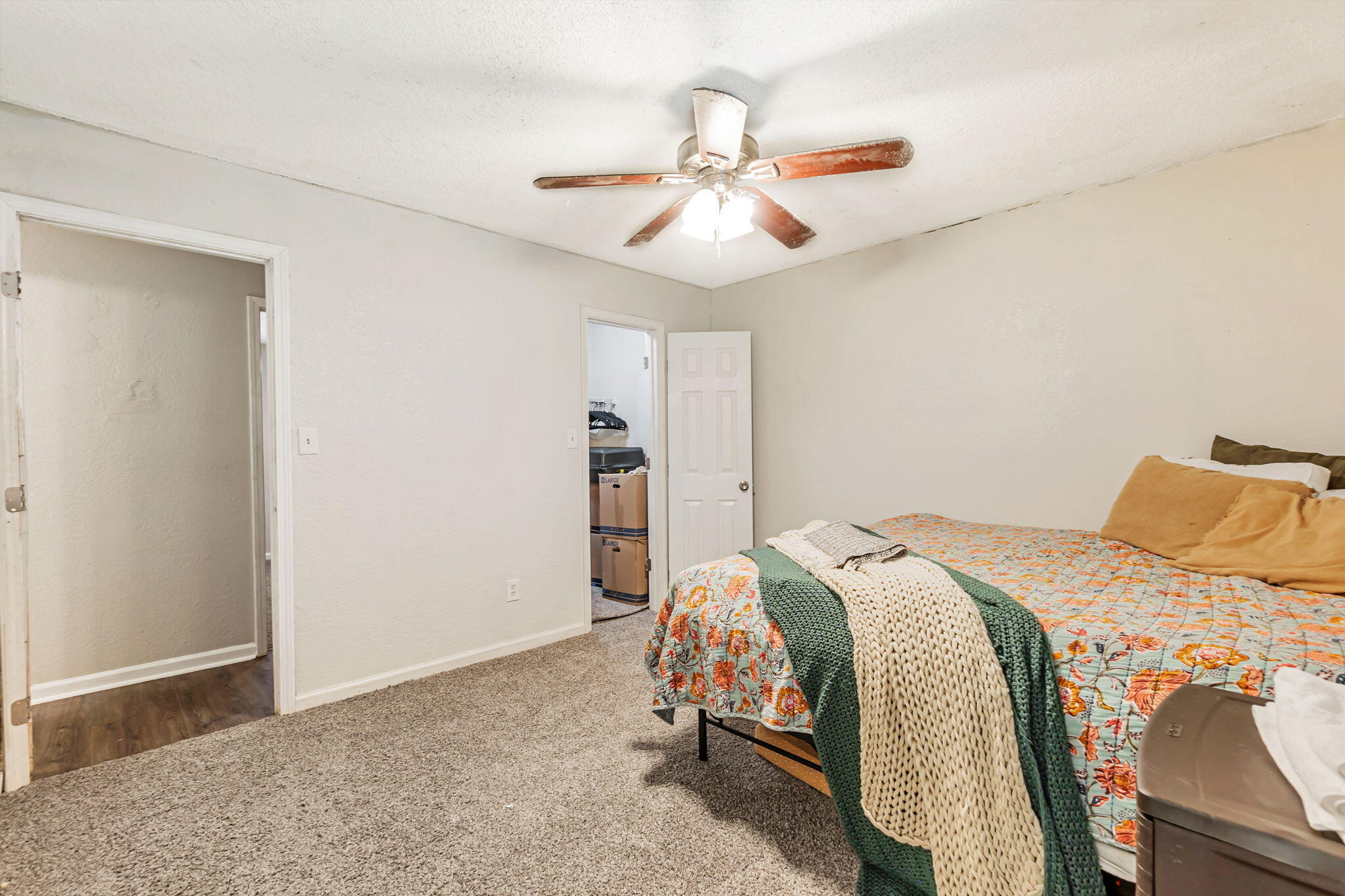 6517 Kennington Circle Milton, FL 32570 - Photo 28 of 37 a bed room with a bed and a ceiling fan