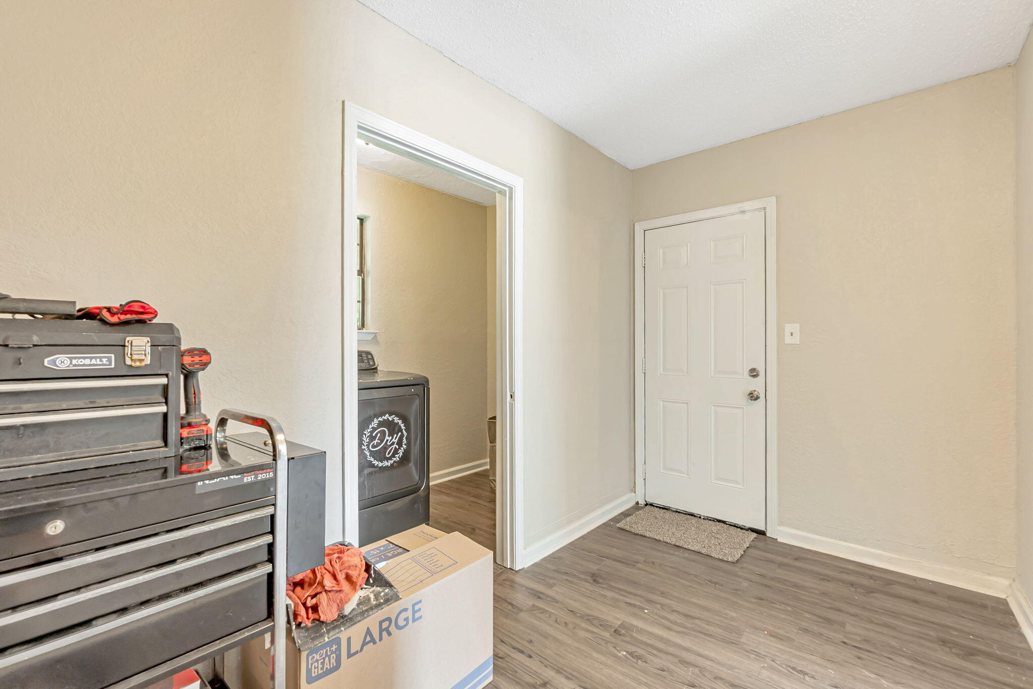 6517 Kennington Circle Milton, FL 32570 - Photo 31 of 37 a view of an entryway with wooden floor