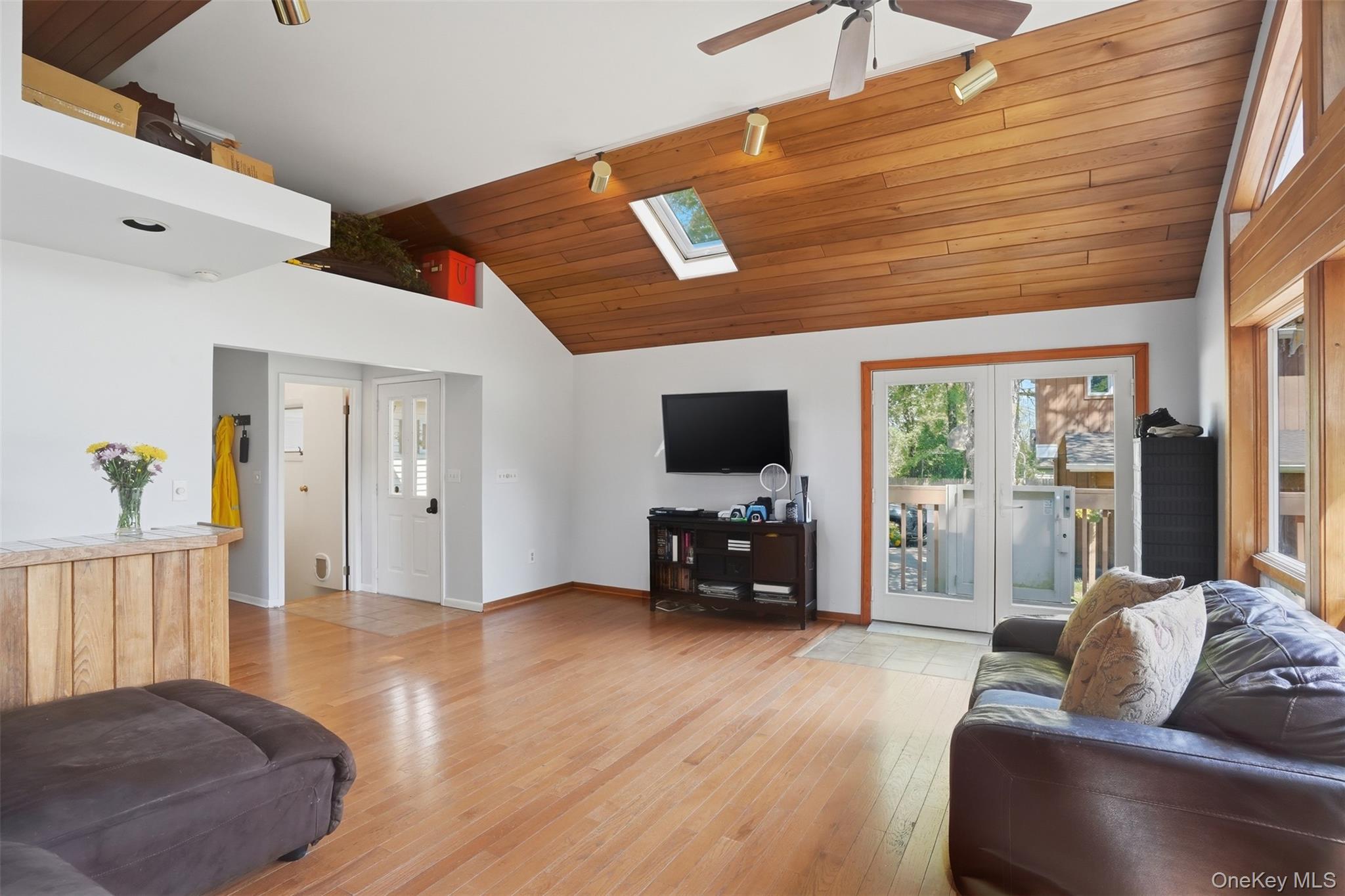147 County Rte 1 Warwick, NY 10990 - Photo 11 of 45 a living room with furniture and a flat screen tv