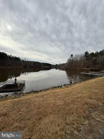 a view of a lake from a yard