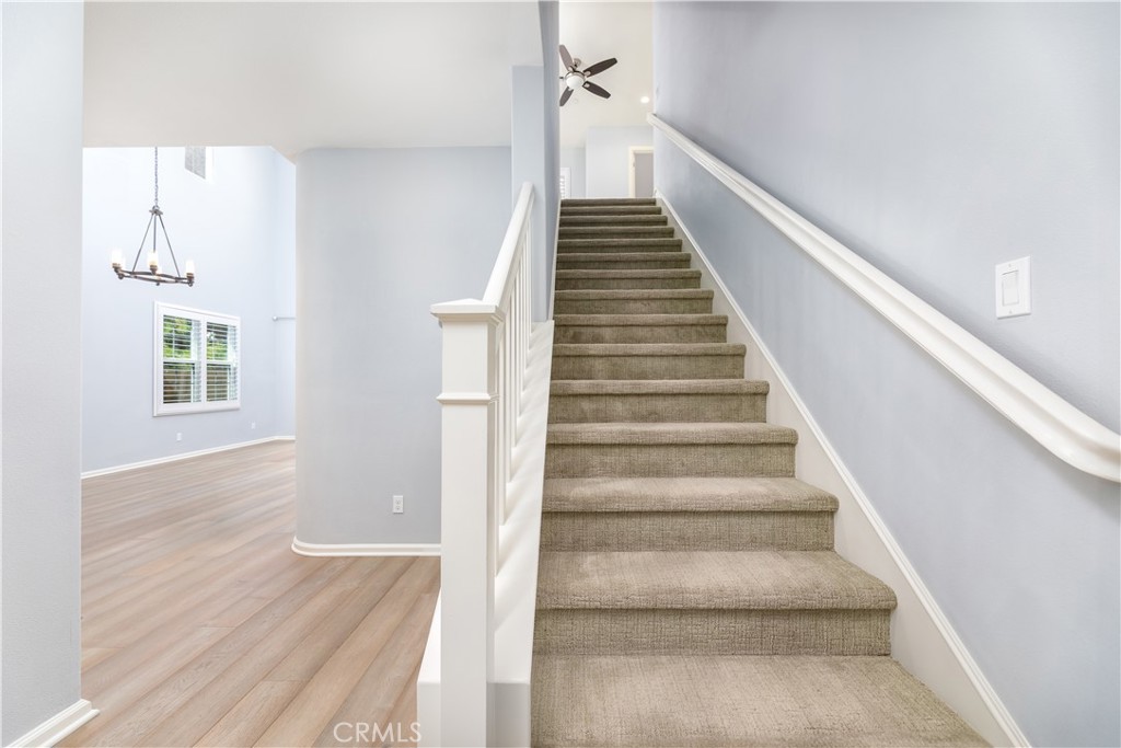 242 Firefly Irvine, CA 92618 - Photo 3 of 24 a view of entryway and hall with wooden floor