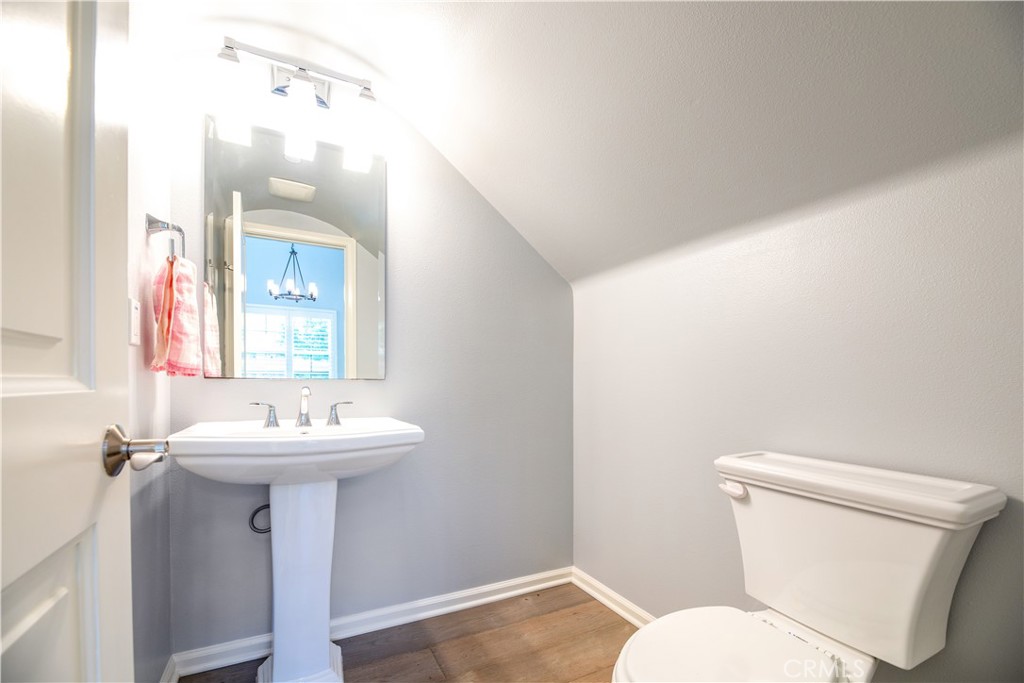 242 Firefly Irvine, CA 92618 - Photo 10 of 24 a bathroom with a toilet sink and mirror