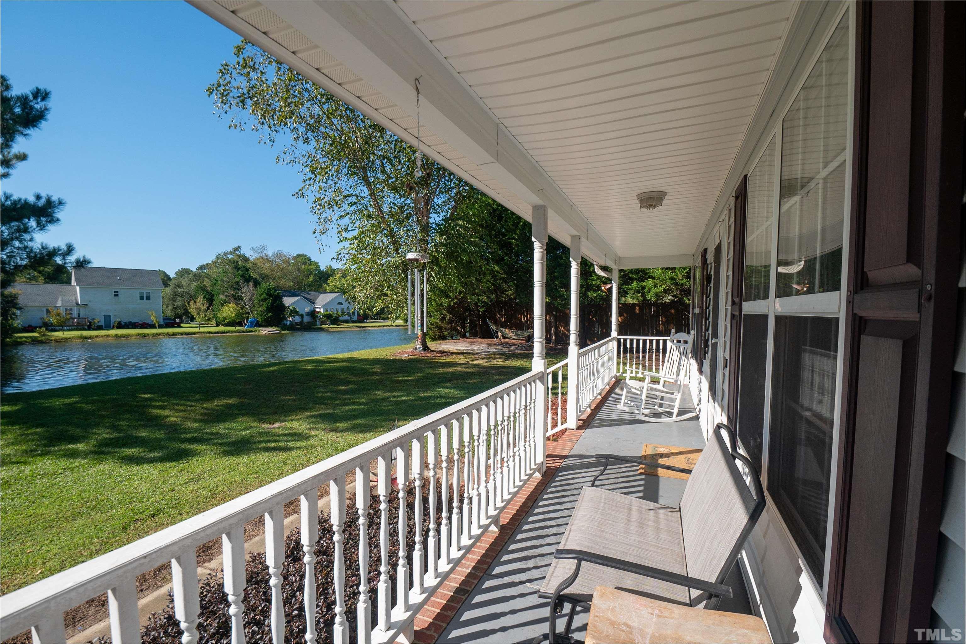 128 Edmondson Drive Willow Spring, NC 27592 - Photo 3 of 24 a view of balcony with yard