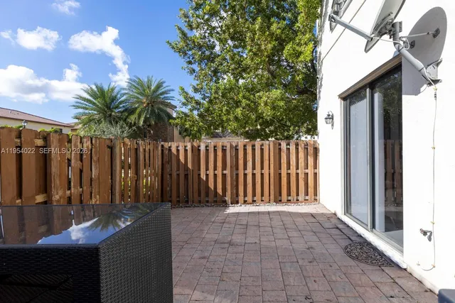 a view of outdoor space with deck and furniture