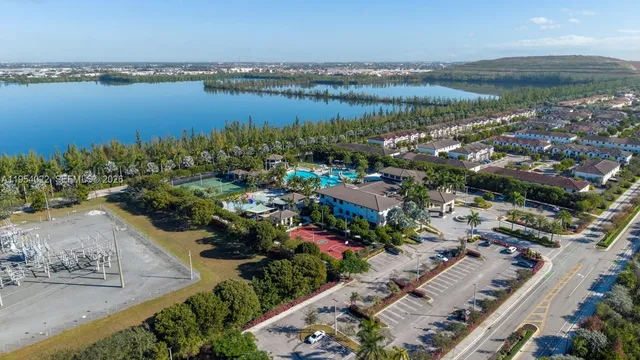 a view of a city with plants and lake view