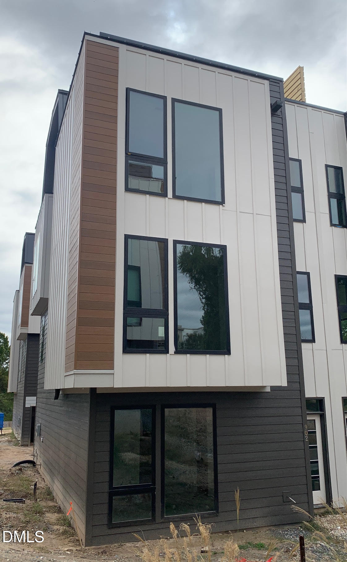 512 Gordon Street, Unit 901 Durham, NC 27701 - Photo 14 of 32 a black and white building with black door