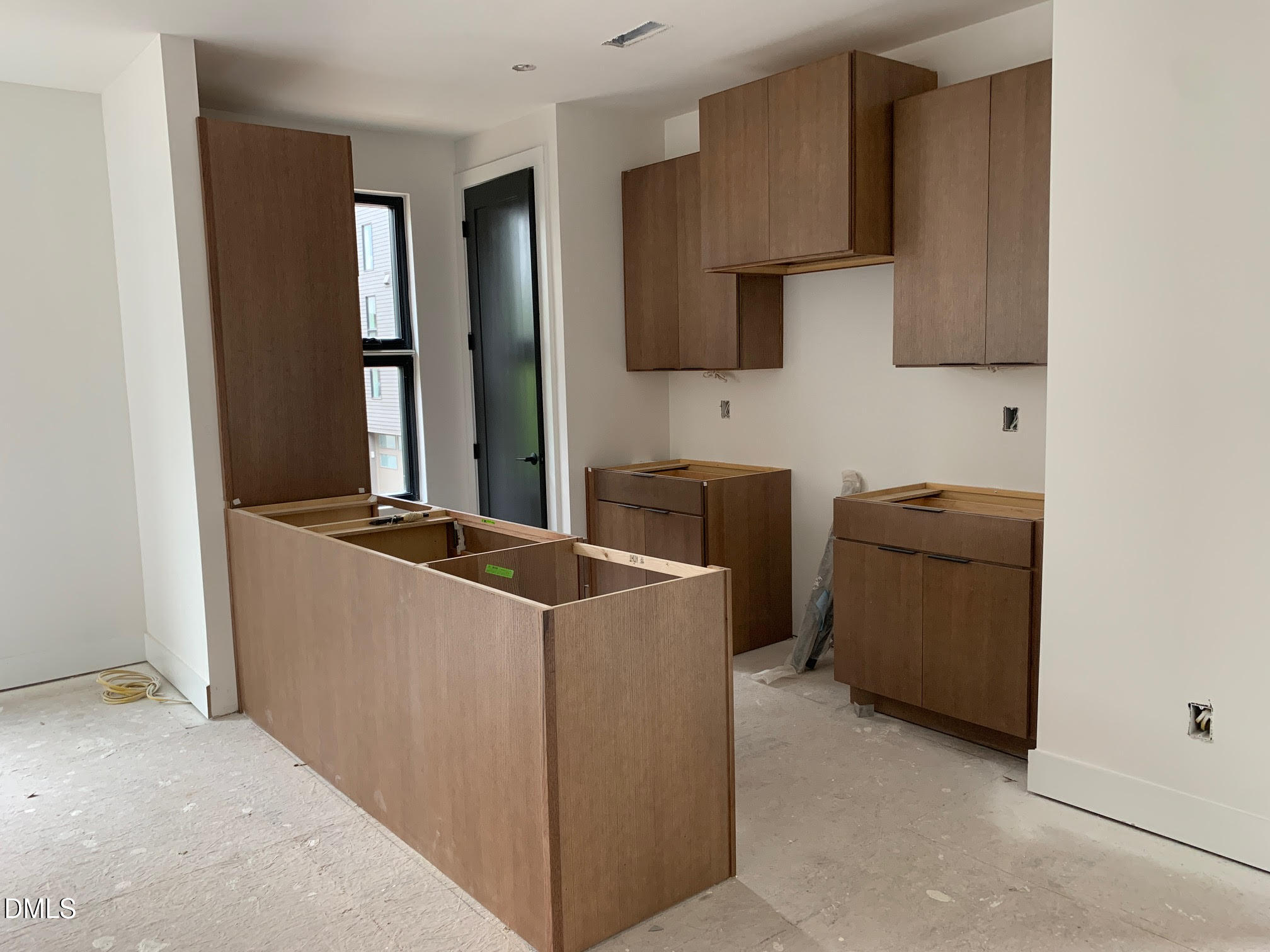 512 Gordon Street, Unit 901 Durham, NC 27701 - Photo 15 of 32 a kitchen with stainless steel appliances a refrigerator and a stove