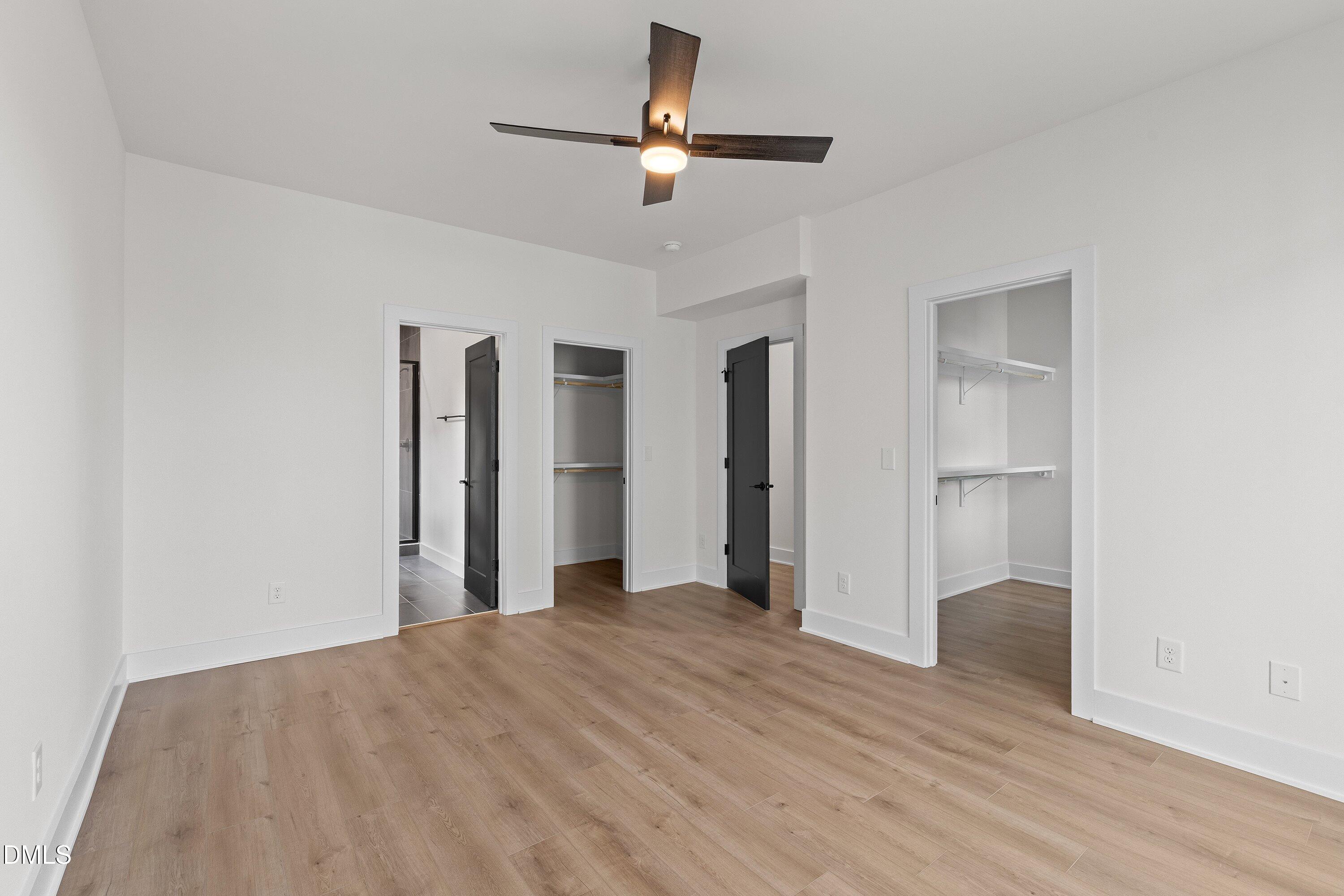 512 Gordon Street, Unit 901 Durham, NC 27701 - Photo 16 of 30 a view of empty room with wooden floor