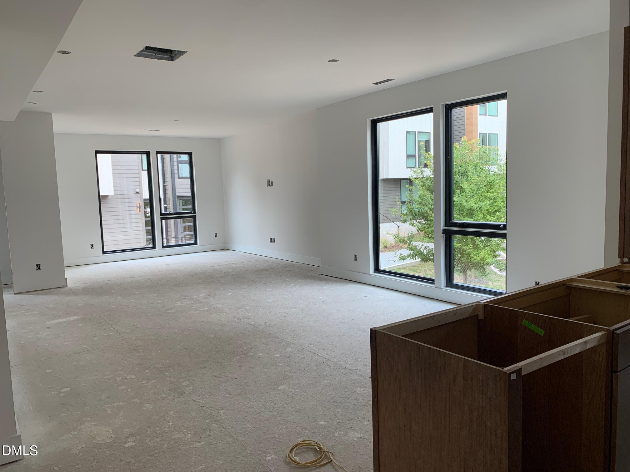 512 Gordon Street, Unit 901 Durham, NC 27701 - Photo 17 of 32 a view of an empty room with a window