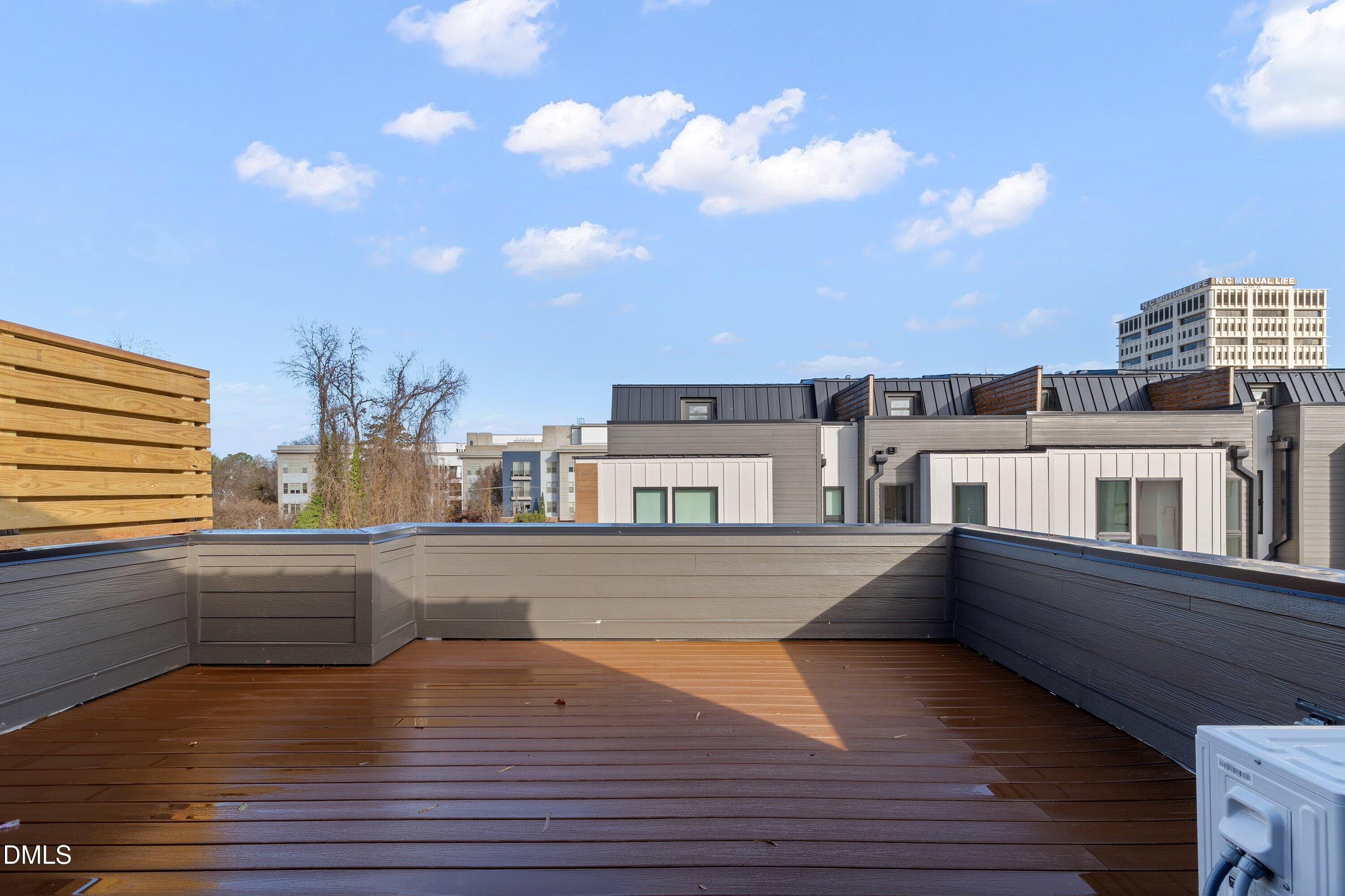 512 Gordon Street, Unit 901 Durham, NC 27701 - Photo 21 of 30 a view of a living room with furniture and a kitchen