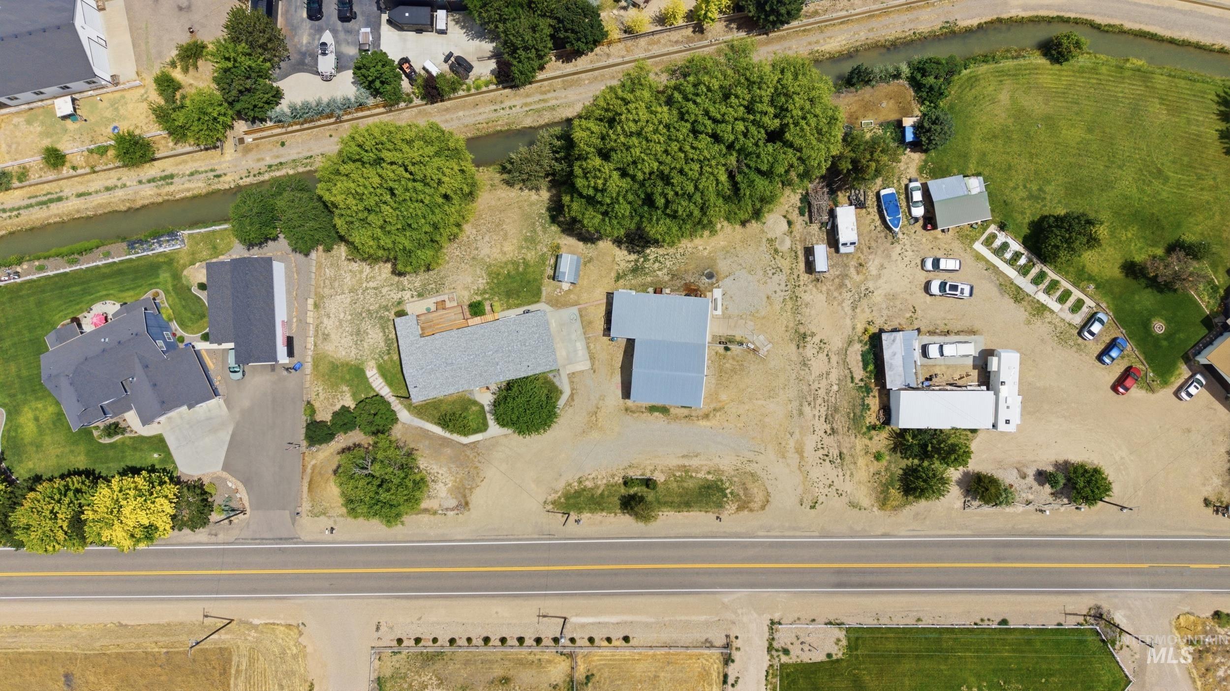 7422 Track Road Nampa, ID 83686 - Photo 4 of 50 Aerial property overview featuring multiple structures and direct road frontage