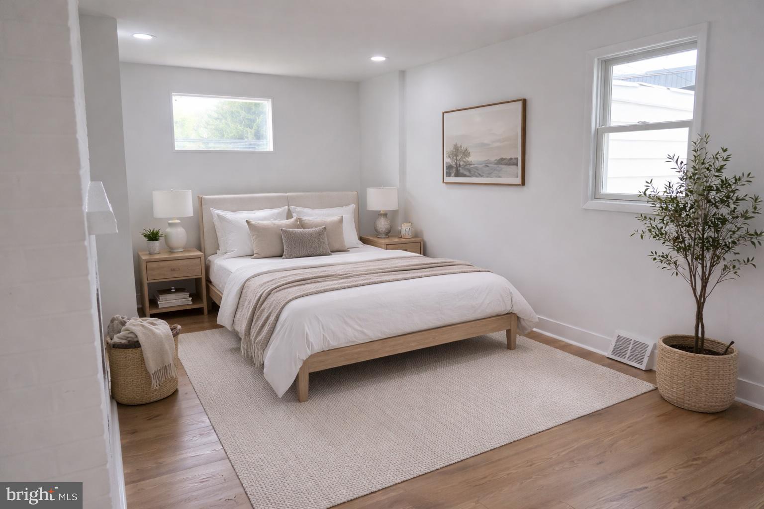 700 Fraser Road Glenside, PA 19038 - Photo 15 of 46 a bedroom with a bed and a potted plant