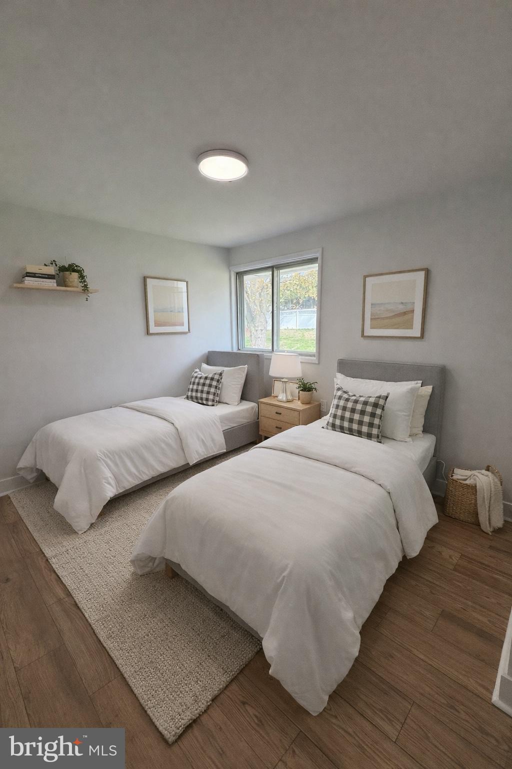 700 Fraser Road Glenside, PA 19038 - Photo 16 of 46 a bedroom with two beds and a night stand