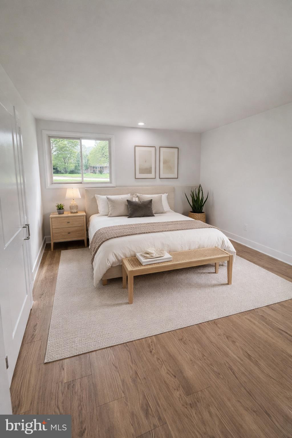700 Fraser Road Glenside, PA 19038 - Photo 17 of 46 a bedroom with a bed and a large window