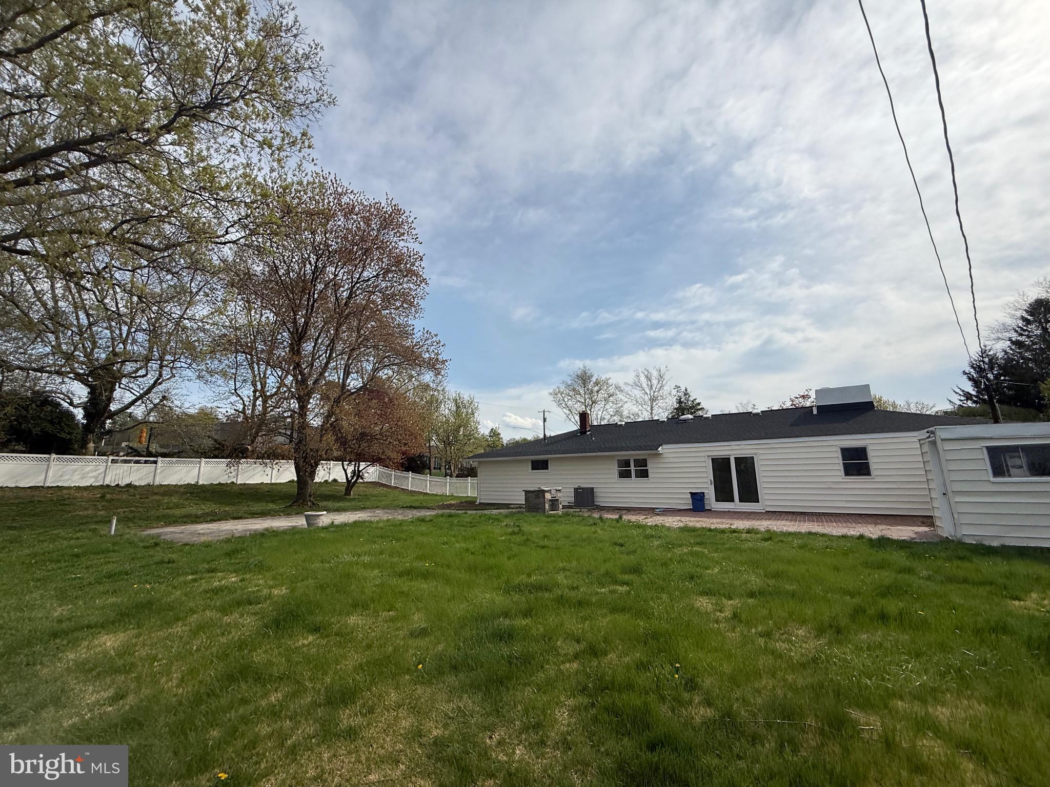 700 Fraser Road Glenside, PA 19038 - Photo 43 of 46 a view of a house with a big yard and a large tree