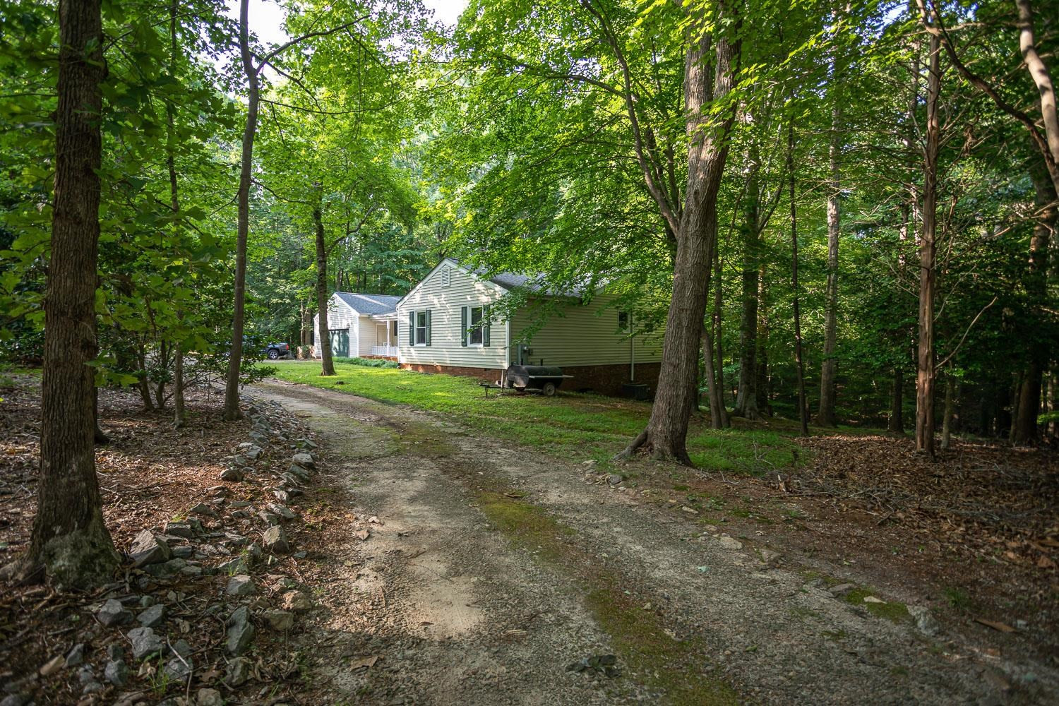 14401 Possum Track Road Raleigh, NC 27614 - Photo 26 of 30 Circular, gravel/earth driveway in front of home. Exterior Front
