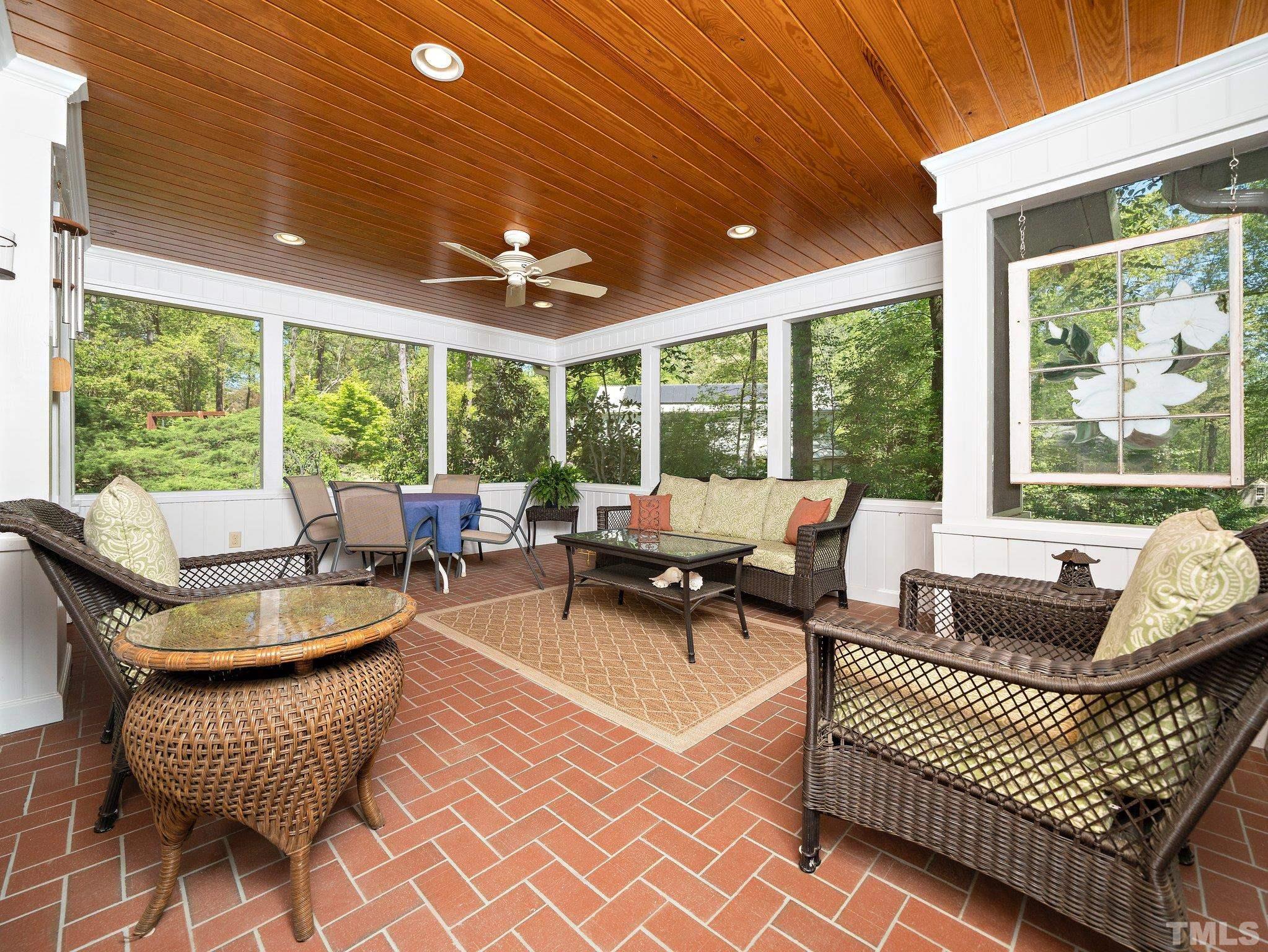 4508 Old Village Road Raleigh, NC 27612 - Photo 11 of 29 a living room with furniture and a large window