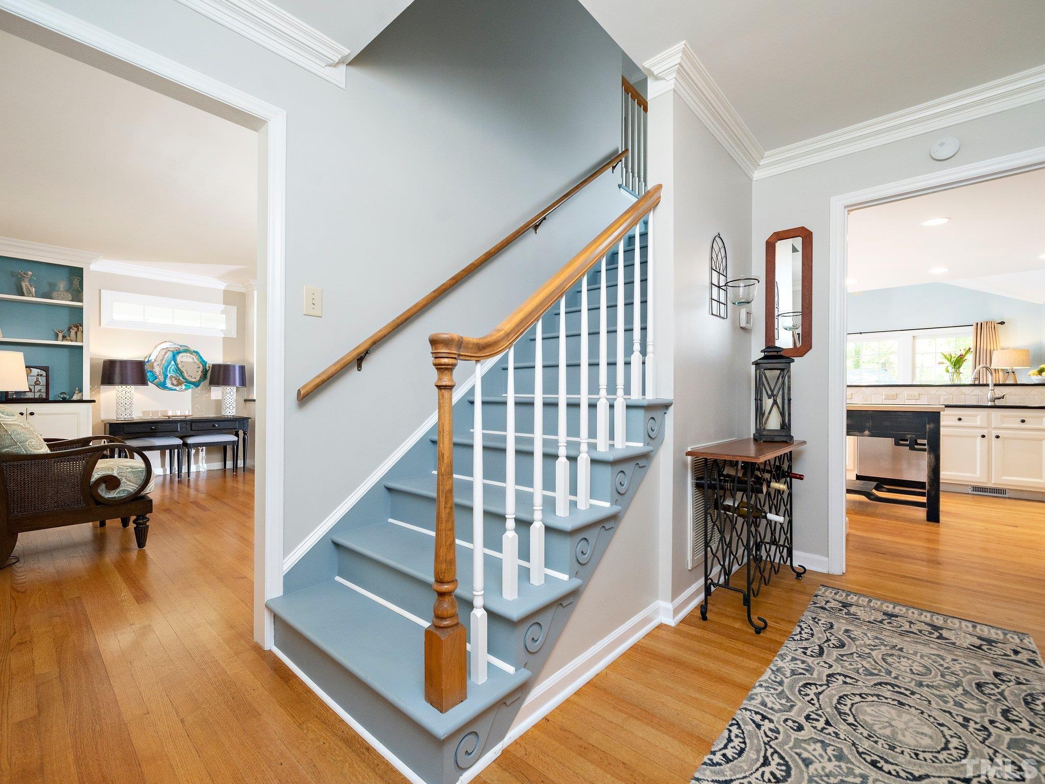 4508 Old Village Road Raleigh, NC 27612 - Photo 12 of 29 a view of entryway and hall with wooden floor