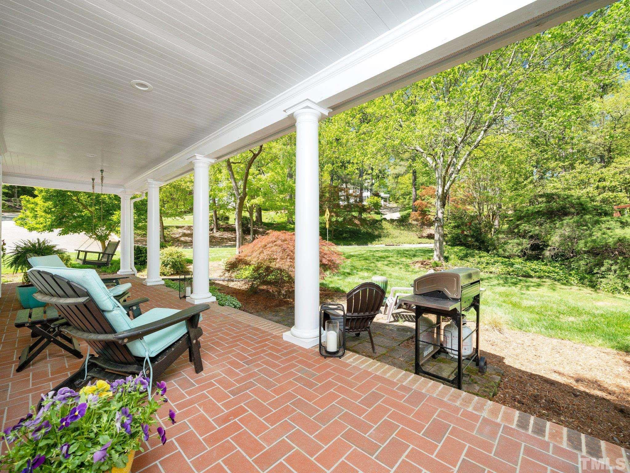 4508 Old Village Road Raleigh, NC 27612 - Photo 26 of 29 a building outdoor space with patio furniture and garden