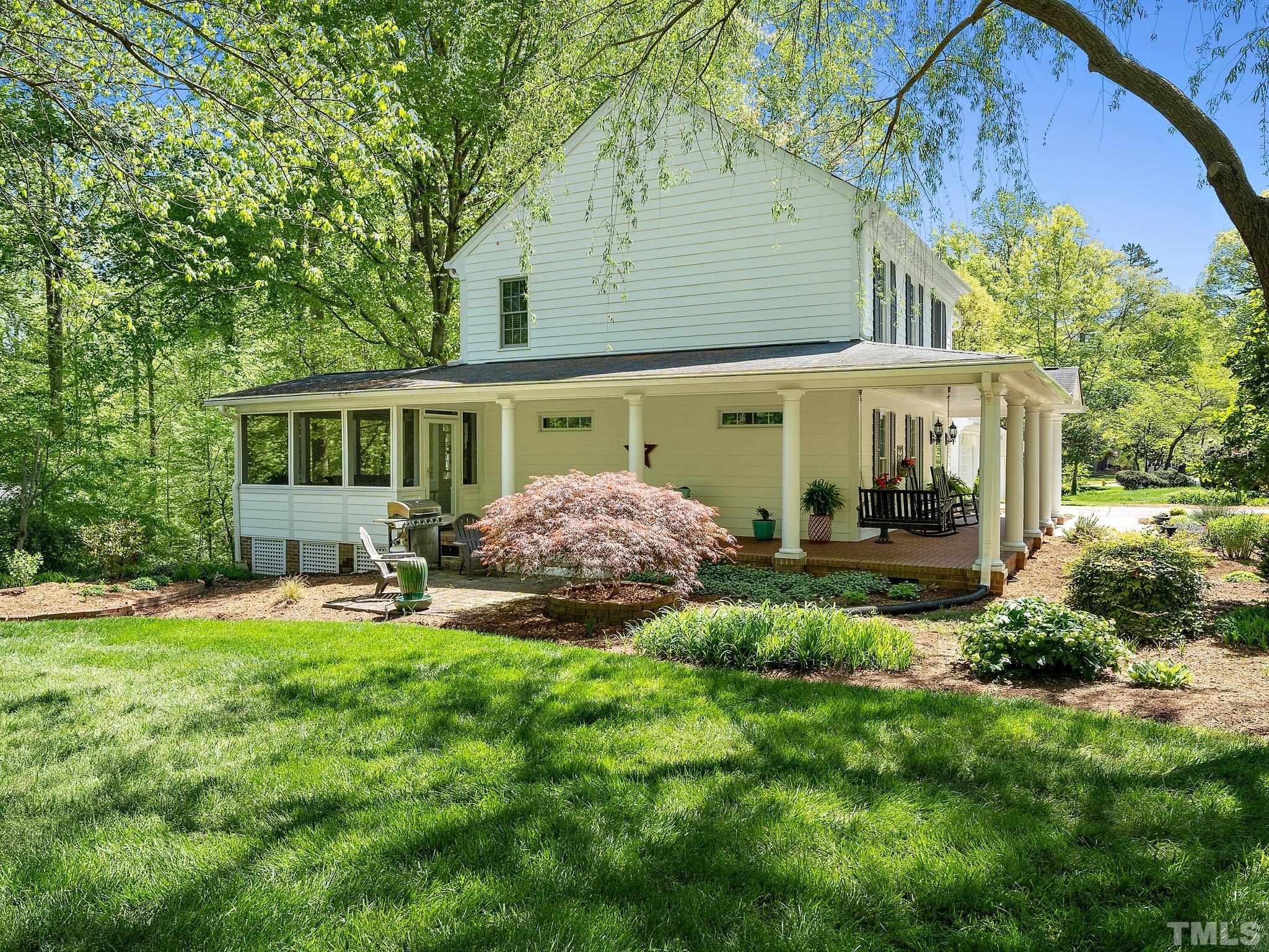 4508 Old Village Road Raleigh, NC 27612 - Photo 28 of 29 a view of a house with backyard and sitting area