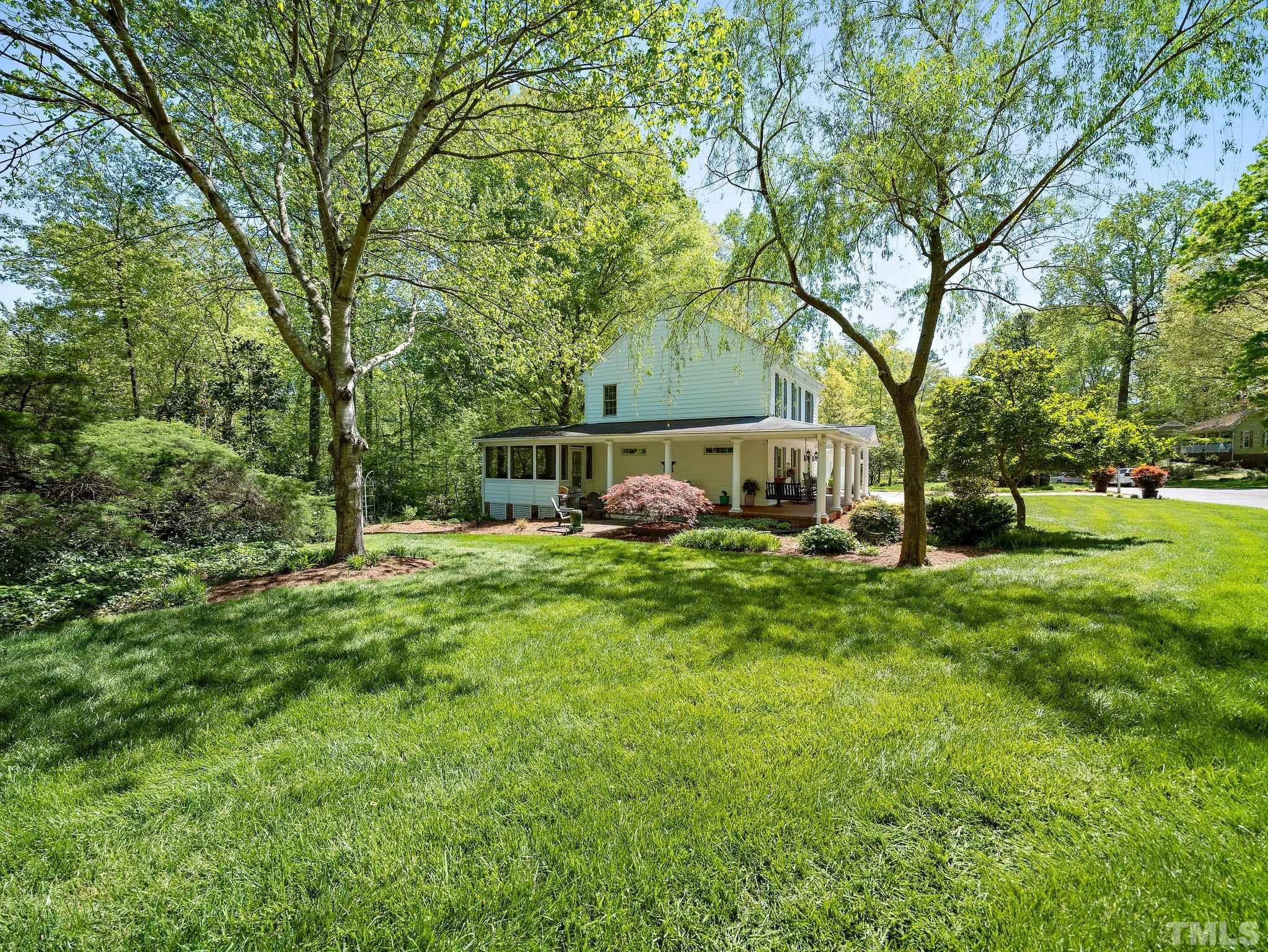 4508 Old Village Road Raleigh, NC 27612 - Photo 29 of 29 a view of a house with backyard and sitting area
