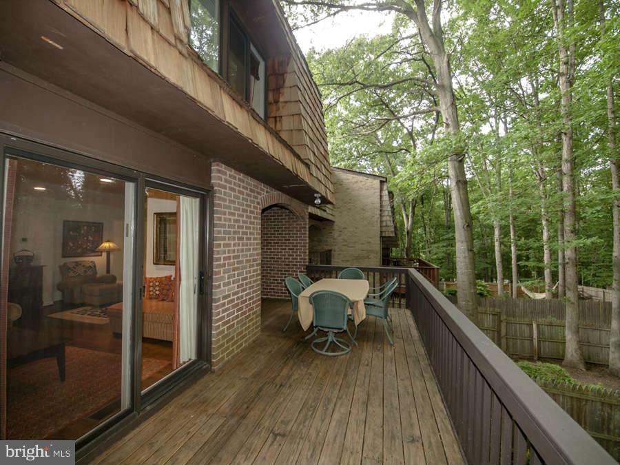 7906 Inverness Ridge Road Potomac, MD 20854 - Photo 3 of 30 a balcony with chairs